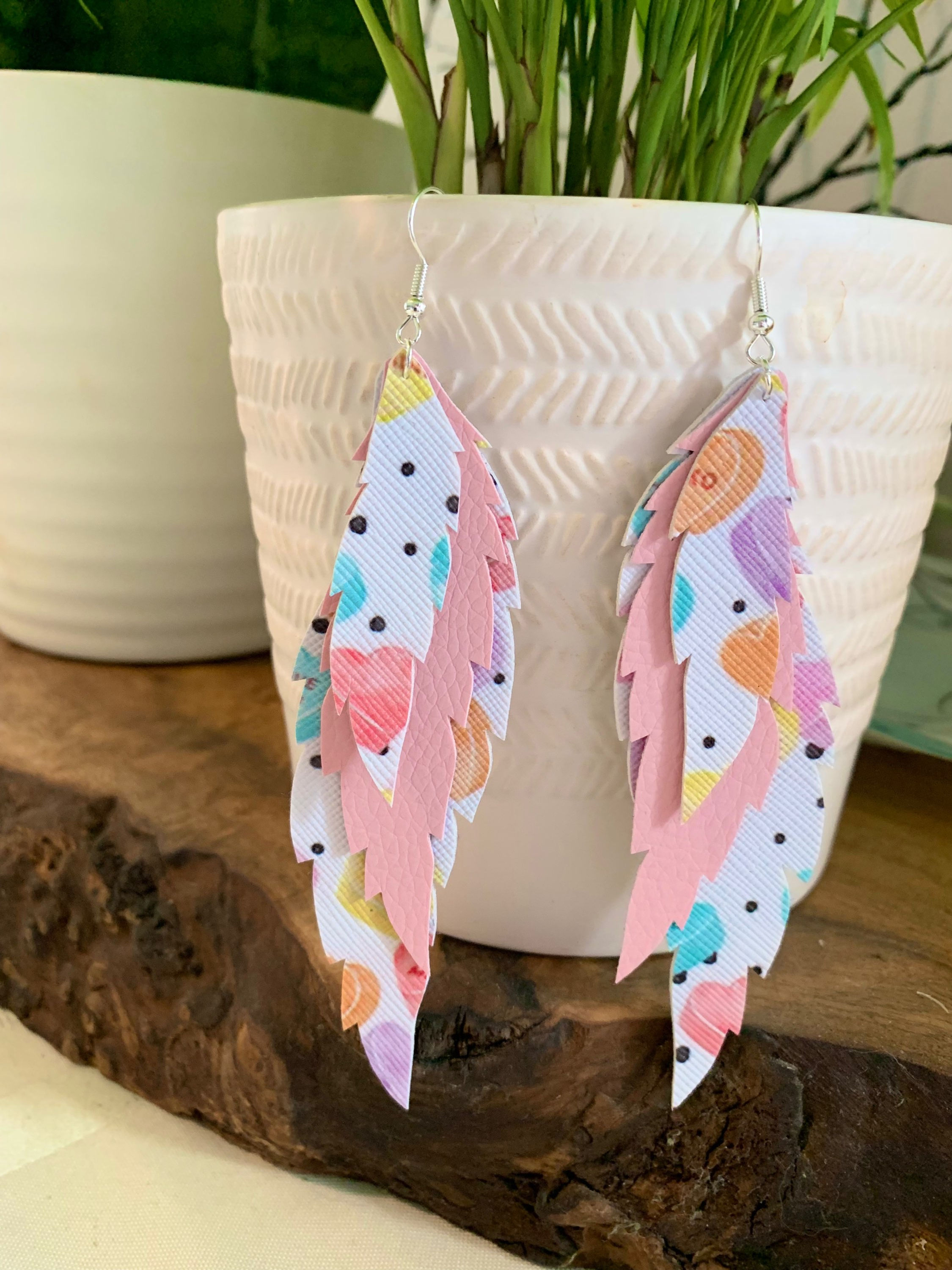 Medium faux leather feather earrings 