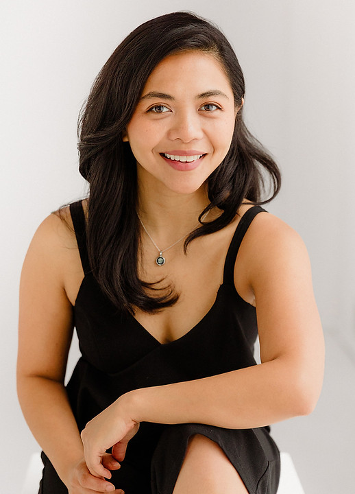 Ratu Nida Homepage Hero Portrait - seated.jpg