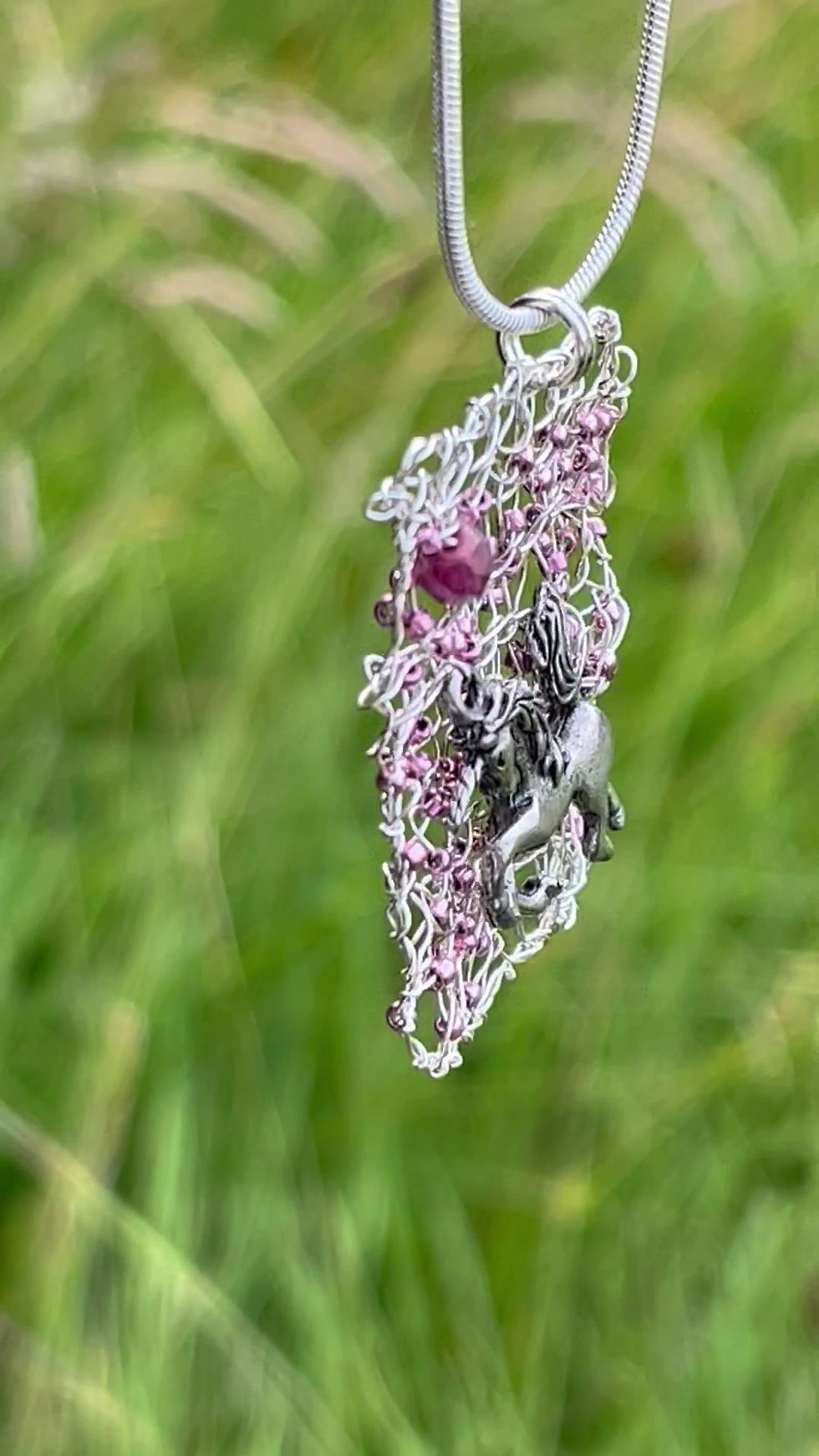 Thumbnail: Knitted wire and glass bead with silver Unicorn charm  pendant