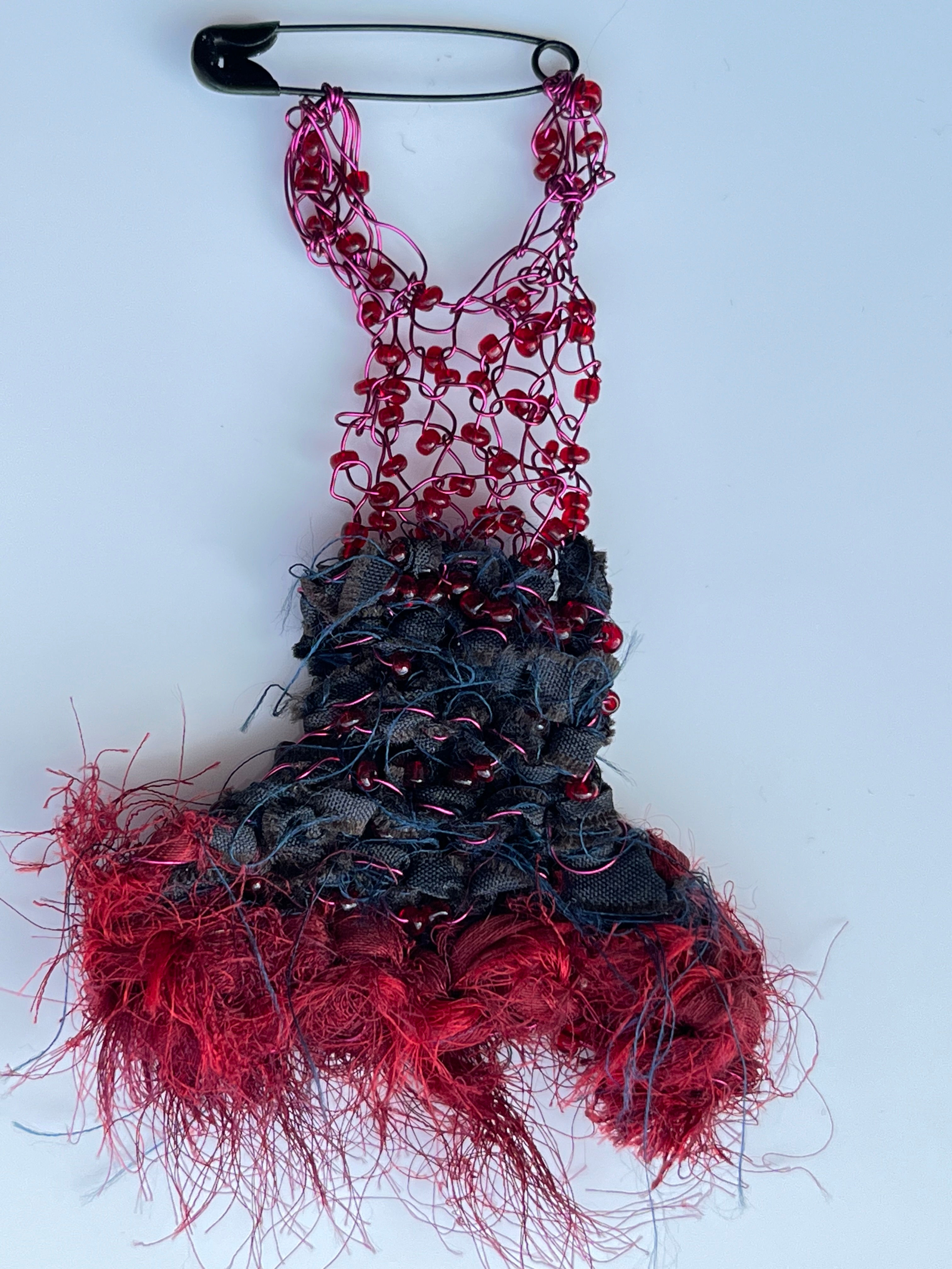 hand knitted mixed media flamenco dress brooch by Angela Smith Jewellery