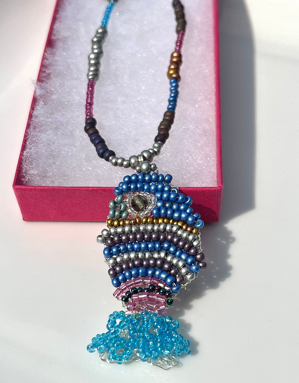 Thumbnail: Knitted fish pendant on beaded chain
