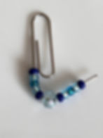 Threading beads onto paper clip