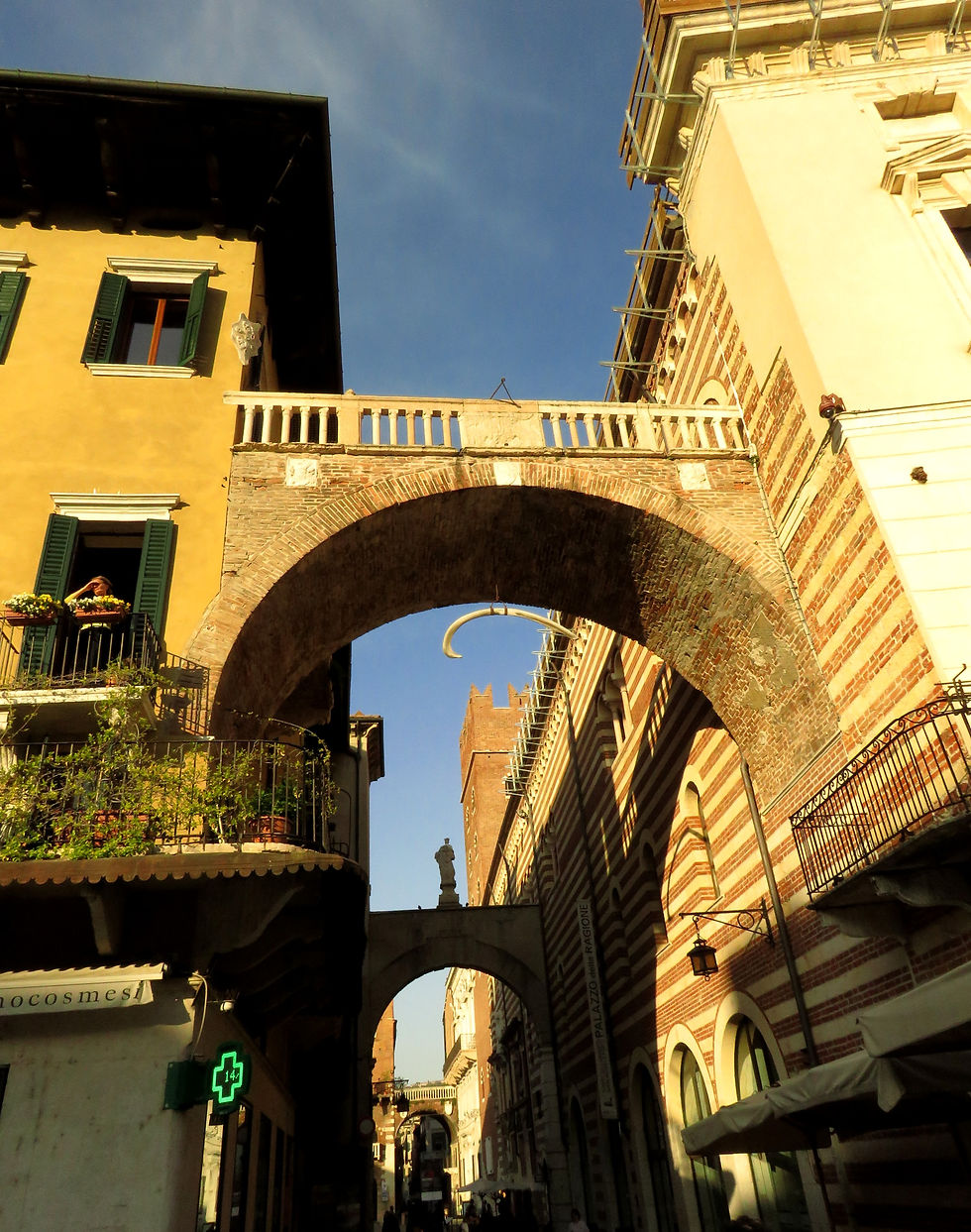Arco della Costa whale bone hanging under the arch in Verona