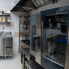 Commercial convection oven in a professional kitchen.