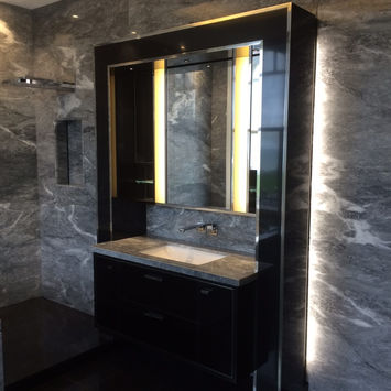 Black Corian Clad Bathroom Cabinet.jpg