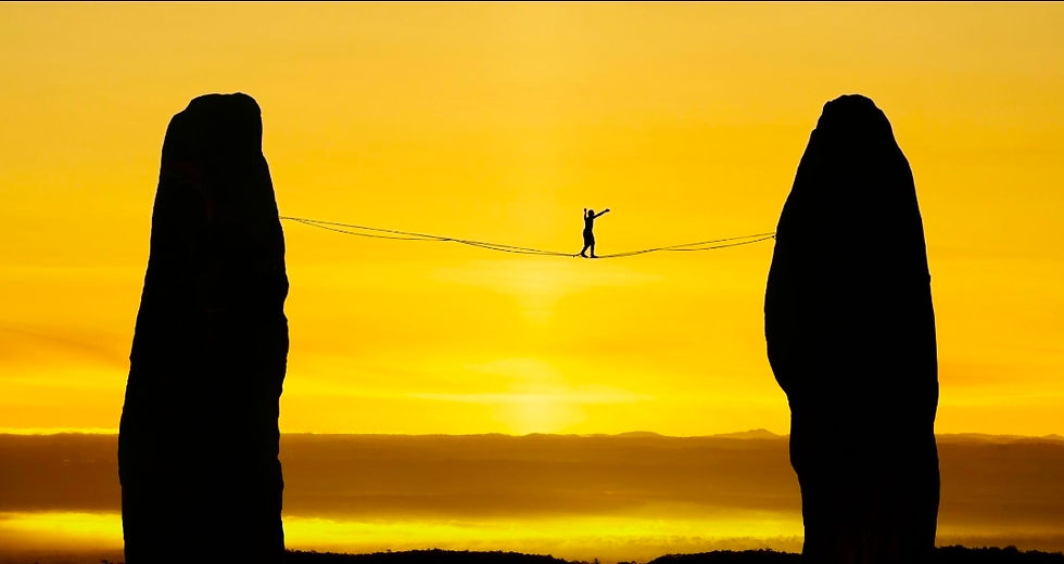 Person walking tightrope against sky symbolizing financial instability and lack of margin for error.