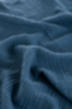Navy colour muslin fabric closer view.