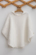 Caline Baby white muslin hooded poncho towel front view.