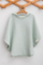 Caline Baby mint colour muslin poncho towel front view.