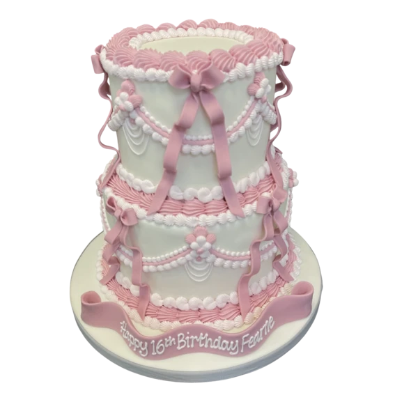 Bespoke celebration cake with intricate floral piping and gold accents, crafted in Solihull, West Midlands.