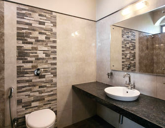 Modern attached bathroom in Super Classic Room at Hotel Rajdeep Mount Abu.