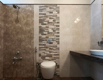 Contemporary bathroom with vanity area in Super Classic Room at Hotel Rajdeep Mount Abu.