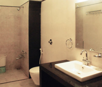 Spacious attached bathroom in Classic Room at Hotel Rajdeep Mount Abu.