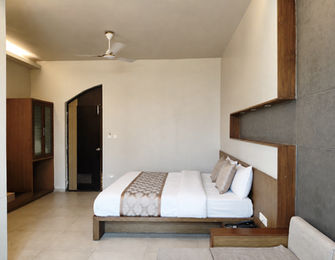Spacious layout of Super Classic Room at Hotel Rajdeep Mount Abu.