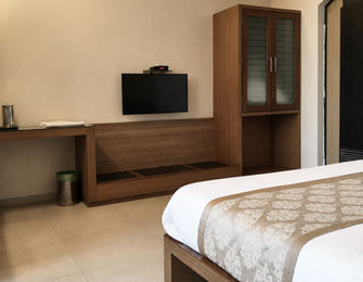 Super Classic Room with storage space and modern amenities at Hotel Rajdeep Mount Abu.