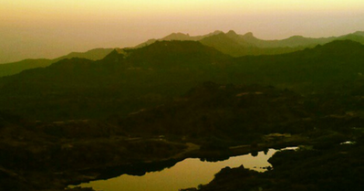 Javai Lake surrounded by Aravalli hills on the scenic drive towards Guru Shikhar in Mount Abu.