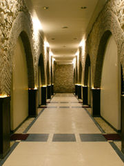 Colonial-style stone passage and hallway at Hotel Rajdeep Mount Abu
