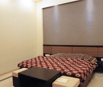 Classic Room with king bed and modern interiors at Hotel Rajdeep Mount Abu.