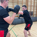 Adult beginner kickboxers.JPG