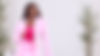 Dr. Ebony Tillery in a pink suit, looking at the camera.