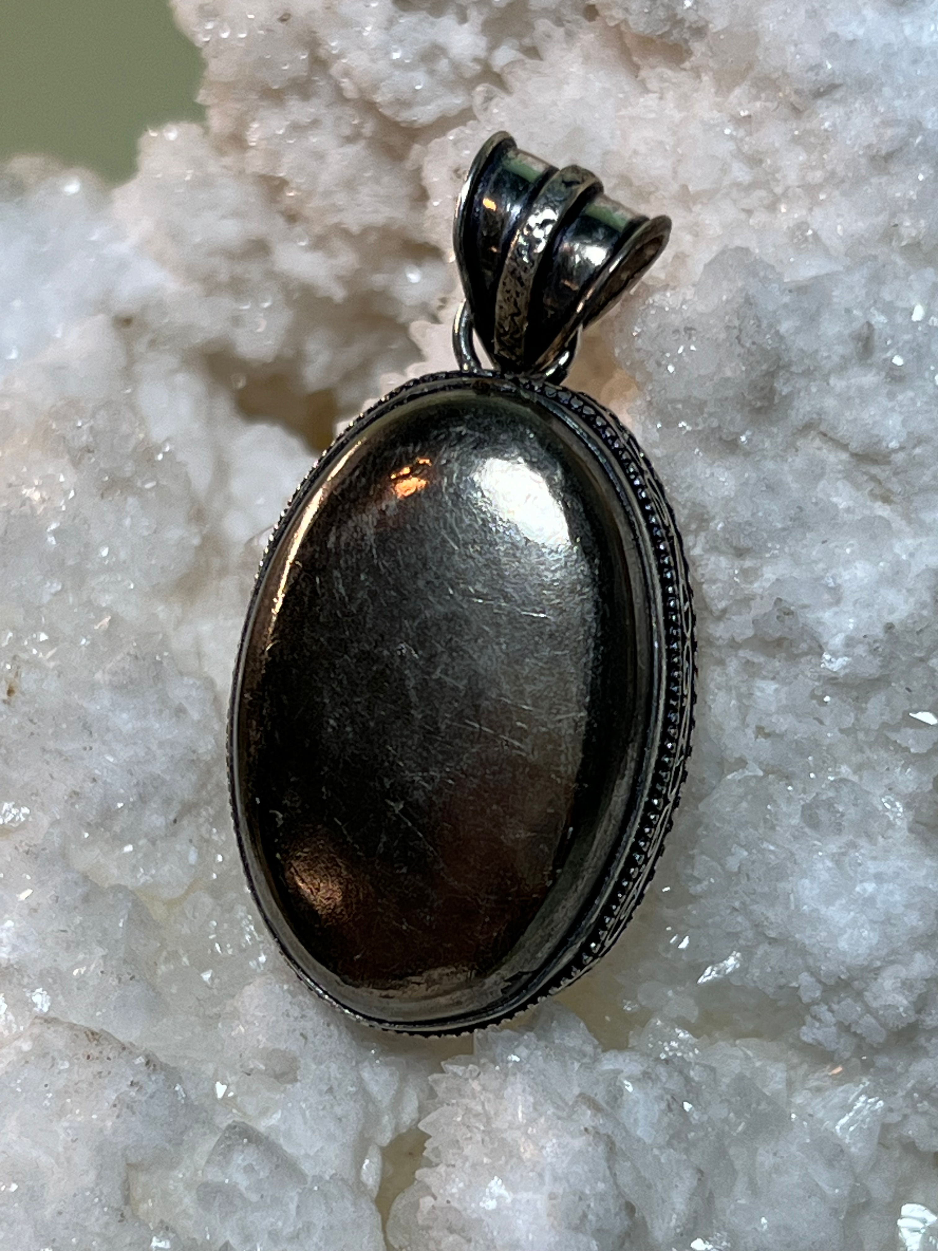 Reiki infused Pyrite Pendant 