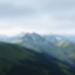 mountainous terrain on a cold day, green colours.jpg