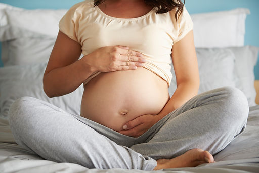 naked-pregnant-abdomen-young-woman.jpg