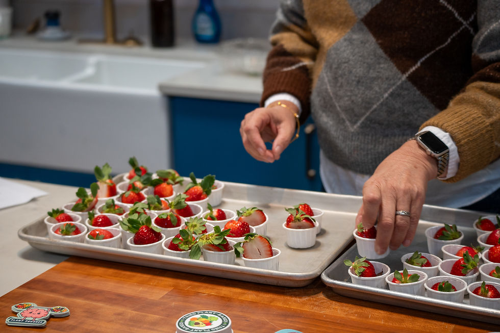 Strawberries on a tray in a lunch room.