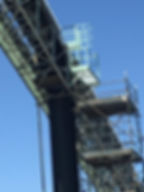 Industrial conveyor and scaffolding by Mac Jay Steelworks.