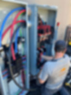 electricians working on switchgear