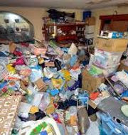 trashed out house that needs hauled off trash