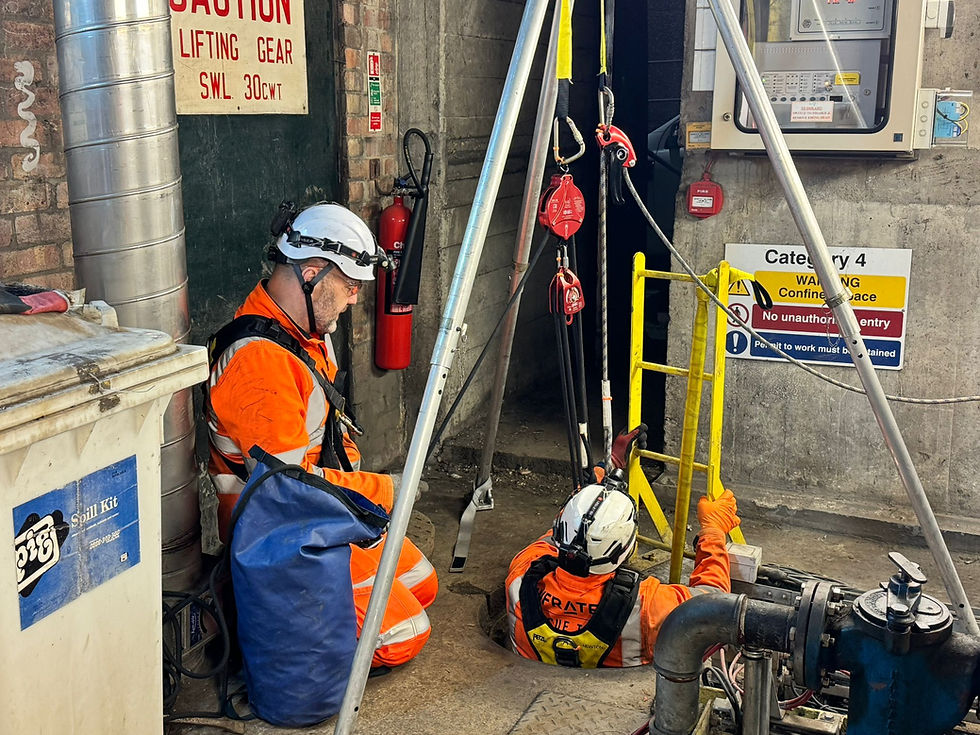 Workers preparing for confined space rescue