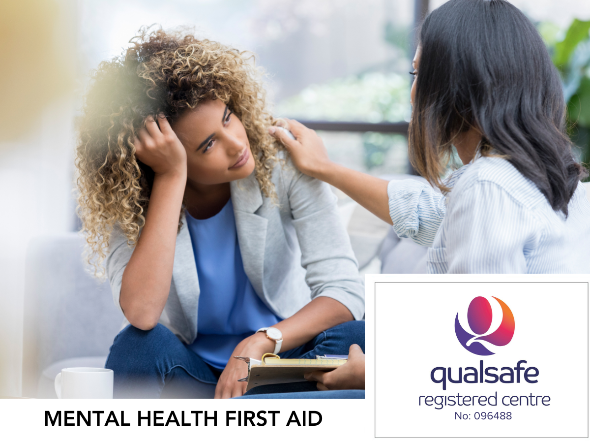 a mental health first aider reassuring a colleague