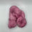 Thumbnail: Hand dyed skein of suri alpaca and silk yarn in a solid color of pink.