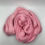 Thumbnail: Hand dyed baby llama yarn shows depth of the soft blush pink color.