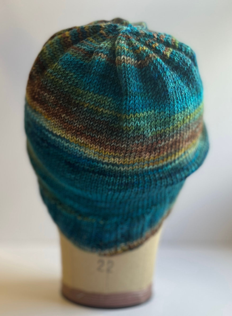 Close-up view of colorful yarn skeins arranged neatly