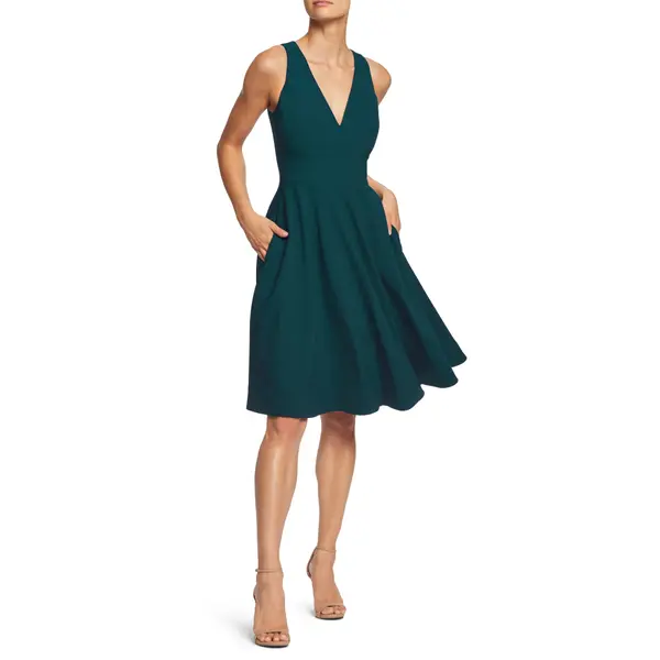 Girl in green sleeveless dress