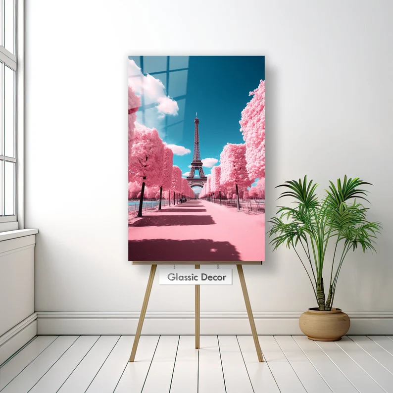 easel holding up teal and pink Eiffel Tower artwork