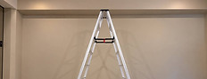 A folding step ladder set up in the studio.