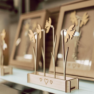 Display piece of wooden laser-cut daffodils.