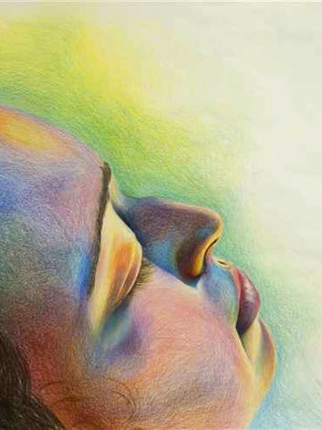 Self portrait drawing in color pencils of the right side of face that is angled upwards. The drawing's style is photo realism with expressive strokes and colors.