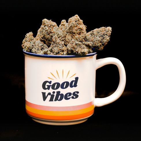 A mug full of Premium THCA flower