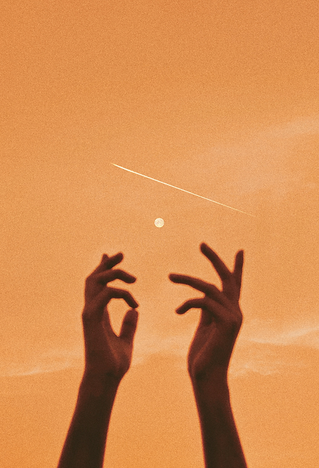 Hands reaching up