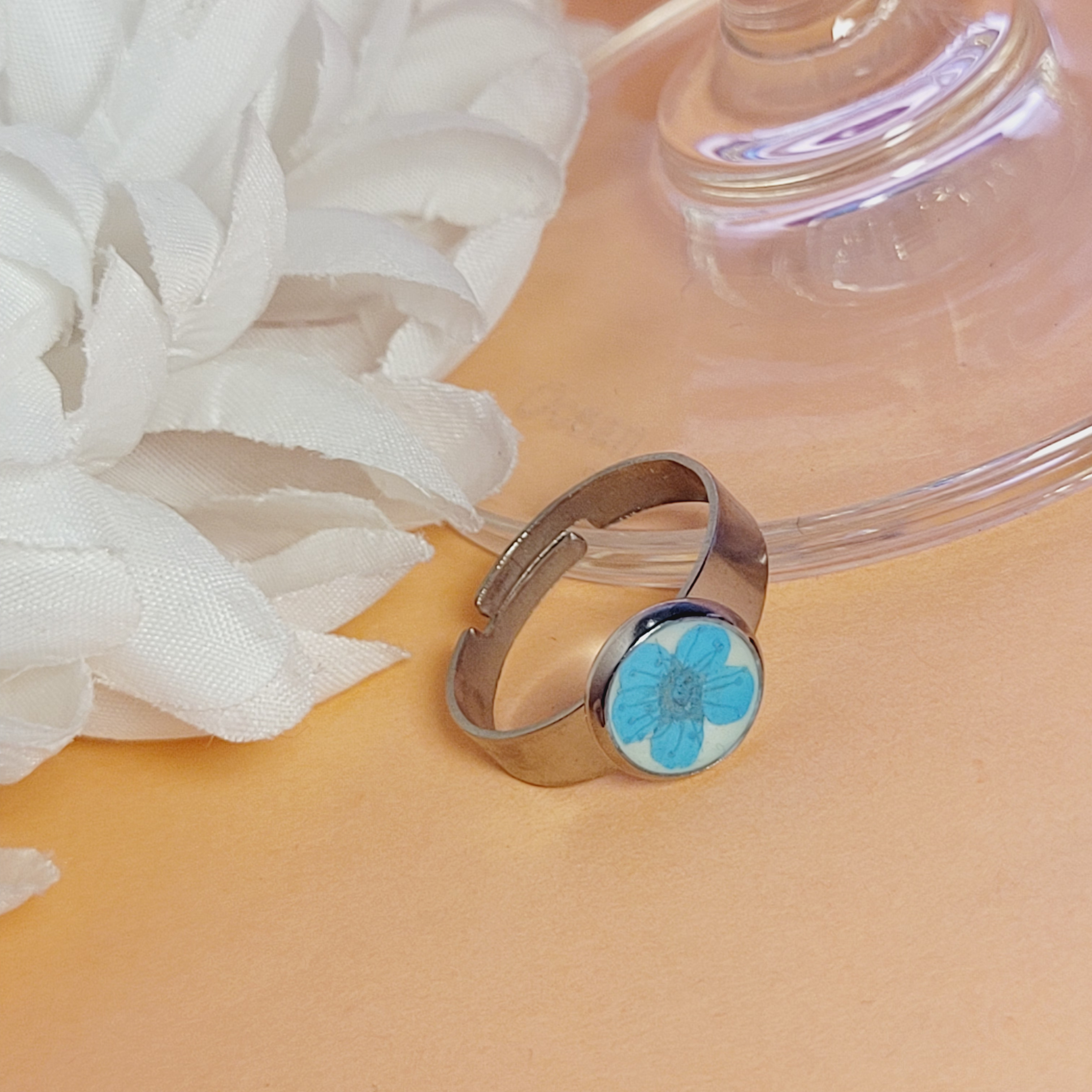 Blue Plum Flower on White Silver Circle Ring | Elegant White-Silver Floral Ring