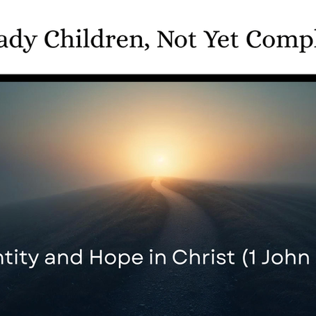 A child's hand silhouetted reaching upward, plus quotation of 1 John 3:1.