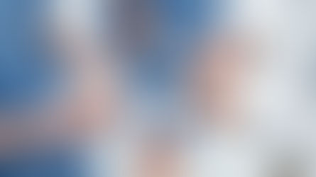 Healthcare professionals demonstrating collaboration as they piece together a puzzle, symbolizing the teamwork essential in patient care.