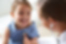 Doctor Examining Child