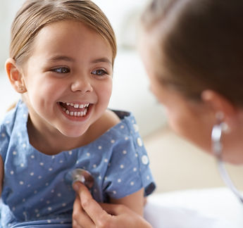 Smiling child with doctor