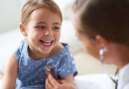 Smiling child with doctor