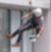 man in black jacket and black pants jumping on window during daytime_edited.jpg